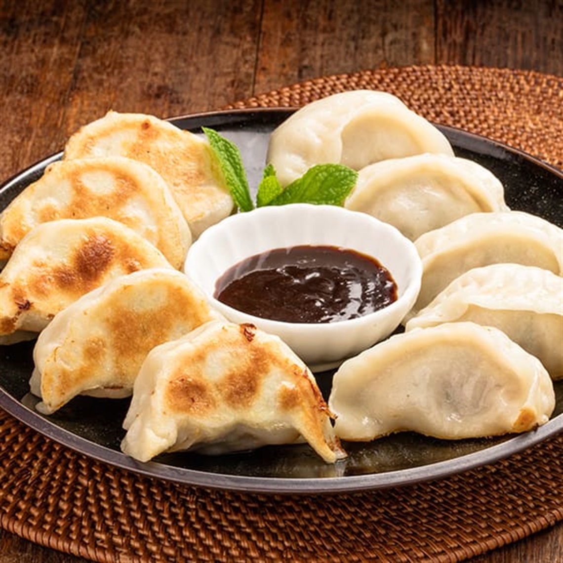 pan fried dumplings with sauce
